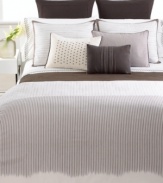 Vera Wang's Ribbon Stripe flat sheet features delicate eyelet embroidery in contrasting brown thread along the hem for a decidedly chic appeal. Finished in luxe 400-thread count cotton percale.
