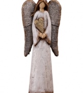 Spreading the love to family and friends this holiday season, this folk-inspired angel cherishes a gentle heart in this collectible figurine.