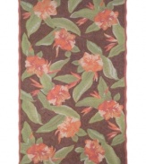Blissfully exotic: Liora Manne's Tommy Bahama Hibiscus Bliss rug brings a lush, tropical feel to any indoor or outdoor space. Durable, fade-resistant fibers are hand-hooked to create a richly layered surface, making the rug a perfect accent in any high-traffic area. Hose off for easy cleaning.