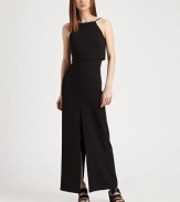 Incredibly elegant in a tailored, halter-neck sheath finished with a sexy high slit.Halter necklineSleevelessCropped overlaySet-in waistHigh back and front slitV-back with double button closureConcealed center back zipperAbout 37 from natural waist52% tencel/48% silkDry cleanMade in USA of Italian fabricModel shown is 5'9 (175cm) wearing US size Small.