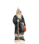 Father Christmas traverses the world on foot with walking stick and bag of treasures in tow. Made with an antique chocolate mold and then hand-painted for sweet, uniquely Vaillancourt style.