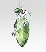 A graceful pinecone shape, in a soft green peridot color with light-catching facets and silvertone accents, including a tiny jingle bell.CrystalSilvertoneAbout 2.25H X .75WMade in Austria