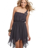 Playfully ethereal, Trixxi gives this sweet dress an otherworldly allure with a sheer, tiered asymmetrical hem. The one-shoulder style is emphasized by a raw-edged ribbon and bead brooch at the strap!