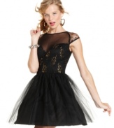 Glittery gold details and a lace bodice add glam while a tulle skirt brings charm to Ruby Rox's dazzling party dress!