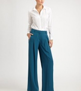 This flowy wide-legged style features flattering front pleats.Self waistband with belt loopsZip fly with hook-and-eye closureFront pleatsBack waistband notchBack welt pocketsInseam, about 34½57% acetate/43% viscoseDry cleanMade in Italy of imported fabric Model shown is 5'11 (180cm) wearing US size 4.OUR FIT MODEL RECOMMENDS ordering true size. 