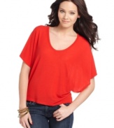 Spruce up your collection of basic tees with this style from Planet Gold that features dramatic batwing sleeves!