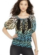 Spruce up your casual wear with this print from Sequin Hearts. The inset lace makes top really pop!