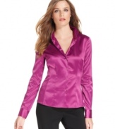 Add a rich pop of color to your outfit with this jeweltone blouse from T Tahari.
