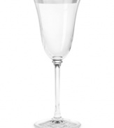 An elegant tulip shape melds with platinum accents to form a stemware collection with grace and style. A chic addition to any home, this set features signature Vera Wang design with timeless appeal. Wine glass shown second from right.