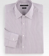 A refined dress style in fine cotton with narrow purple stripes. Buttonfront Moderate spread collar Cotton Dry clean Made in Italy 