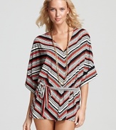 Inspired by California surf-culture, this striped cover up from Juicy Couture is a must for the laid back lounger. Make waves -- this drawstring dress is tubular with sandals and boho beads.