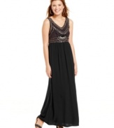 A bodice of studs and seam design wears like chic, fashionista armor on this tribal-inspired maxi dress from Angie!