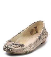 In classic brown or exotic snake-embossed, these Jack Rogers moccasins offer a comfortable yet polished aesthetic.