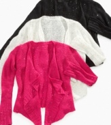 Sequined allover cardigan makes this a festive and bold piece by DKNY. Makes a great gift.