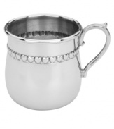 They'll love it. A gift for babies that parents will cherish, this Reed & Barton baby cup gleams with a band of embossed hearts in solid pewter. With child-friendly rolled edge.