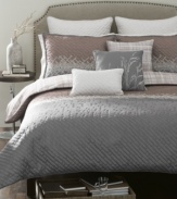 A plush landscape of embroidered blocks brings relaxing sophistication to your space in this serene Florence comforter set from Bryan Keith. Finished with a lovely mauve and gray color scheme.