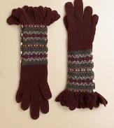 A warm pair of gloves is knit in a colorful Fair Isle design with extra-long cuffs for stylish heritage flair.Extra long, pointelle-knot ruffled cuffsOn-seam button-and-loop closureFully lined85% cotton/15% merino woolHand washImported