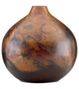 Finished by fire, each Burnished Copper vase is an individual. Rich earth tones and a unique mottled design distinguish the large, sculptural vessel for modern settings. By Donna Karan Lenox.