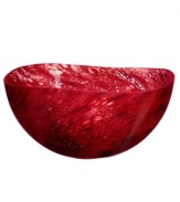 Embrace the exotic side of Kosta Boda with this large Dino bowl. Heavy art glass in a fluid, organic shape and rich shades of burgundy punctuates decor with mesmerizing beauty. A glossy, textured finish makes every inch unique.