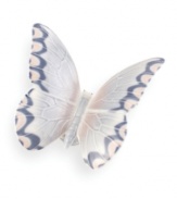 The symbol of new birth and natural beauty, this butterfly figurine brings complete grace and wonder to any home. Handcrafted in Spain of pure porcelain.