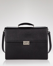 Salvatore Ferragamo Revival double gusset briefcase. Textured leather briefcase with lock combination on front. Features topstitching detailing, internal pockets and expandable folders on side. Salvatore Ferragamo Revival double gusset briefcase. Textured leather briefcase with lock combination on front. Features topstitching detailing, internal pockets and expandable folders on side.
