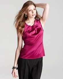 A knife pleated neckline adds texture to the Elie Tahari Winona top, the perfectly effortless blouse that you'll reach for time and time again.