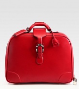 Vibrant, medium-sized duffel ideal for easy-travel in smooth leather.Zip, strap buckle closureTop handlesInterior zip pocketID Tag and key holderMetal feetFully lined18W x 14H x 6DMade in Italy