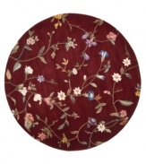 Crimson enchantress. The Julian Collection sets new standards of quality and clarity for hand-tuffed, hand-carved carpets. Bright salmon and ivory blooms on leafy vines set against a rich, ruby ground. Woven from luxurious 100% premium wool pile rivaling the finest hand-knotted rugs for texture and opulence. Luster-washed for added sheen.