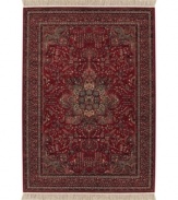 The Couristan Kashimar collection features designs inspired by Oriental and Persian motifs. While each pattern is painstakingly crafted to emulate the classic design traits of long ago, the colors of Kashimar reflect the most popular looks of today. With features like 100% New Zealand semi-worsted wool, Couristan's exclusive locked in weave, crystal-point finish and hand-knotted fringes, the Medallion Antique Red rug offers a richly detailed design and warm red and grey floral details, a sophisticated addition to any room of your home.