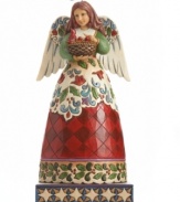 Hark! This gentle angel sets a joyful tone in holiday homes. Baby cardinals chirping in her basket and carved in her skirt celebrate the beauty of nature. With brilliant holly detail, red check and swirling winter wind. From Jim Shore.