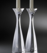 With a design inspired by a pristine forest waterfall these candlesticks have delicate curves and elegant edges that cast light on every corner of the room.