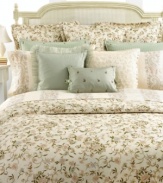 Classic paisley in soft colors alternates with a solid ivory stripe on this cotton sateen sheet, presenting a luxurious bedding addition from Lauren Ralph Lauren.