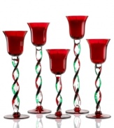 A festive twist. Combining vibrant red and green glass, these Winterberry candle holders from Pfaltzgraff make a merry impression in any holiday home.