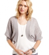 Slip on this open-knit shrug from Cotton Emporium for a simple way to add fresh style to your look! Cool metallic threading makes it a cute piece for day or night.