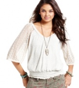 Crochet-knit bell sleeves and a slouchy-chic fit make this American Rag sweater undeniably cool.