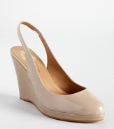 Elie Tahari's glossy Alexia wedges showcase a classic slingback silhouette and timeless style.