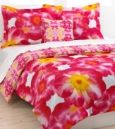 The Sasha three-piece comforter set features a striking collection of purple and orange blossoms contrasted with a reversible kaleidoscope graphic. The combination of floral and geometric shapes creates a fun, feminine look for contemporary bedding. (Clearance)