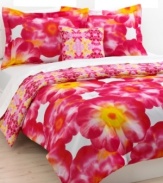 The Sasha three-piece comforter set features a striking collection of purple and orange blossoms contrasted with a reversible kaleidoscope graphic. The combination of floral and geometric shapes creates a fun, feminine look for contemporary bedding. (Clearance)