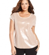 Let your style shine this season with Calvin Klein's short sleeve plus size top, showcasing a sequined front.