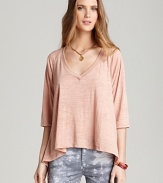 A high/low hem creates a chic drape effect on this wear-with-everything Nation LTD tee.