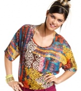 Add tribal flavor to your wardrobe of fun, summery tops with this printed, semi-sheer style from Material Girl!