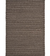 The softest wool and felt fibers are here hand-woven in India to replicate the handsome, rugged look of nautical sweaters in the Spinnaker Knit area rug from Lauren Ralph Lauren. A clean and simple, yet authentic staple made for any modern home.