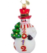 Commit this season to memory with Christopher Radko's dazzling snowman ornament, featuring handcrafted glass with a red top hat, decked-out tree and belly full of glitter.