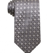 Add some dimension to your look with this distinguished patterned tie from Tasso Elba.