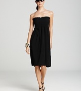 Perfect effortless sun style with this pull-on tube dress from Magicsuit. This easy-to-wear piece features smocking at the chest for silhouette enhancing glamour.
