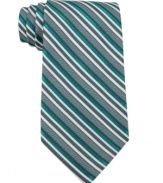 Follow the lines in your wardrobe. With sleek stripes, this Calvin Klein tie always keeps it sleek.