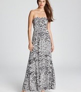 Tap into your wild side with this animal-print GUESS strapless dress, cut in a flowing maxi silhouette.