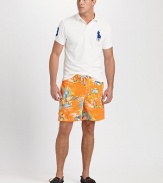 Designed for a relaxed fit, the East Hampton swim trunk is rendered in soft, quick-drying nylon with a bold tropical print.Shoestring waistVelcro® flySide slash pocketsFlap patch pocket on right legPolyester liningInseam, about 7NylonMachine washImported
