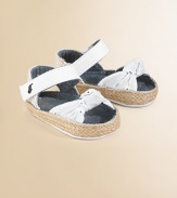 A sweet pair of stylish, eyelet-detailed espadrilles for your little fashionista with an ankle strap and grip-tape closure.Hook-and-loop strap with grip-tape closureCanvas upperCotton liningCanvas solePadded insoleImported