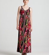 A rush of tropical florals, this Calvin Klein maxi dress blends prints big and small for the perfect fashion mash-up.
